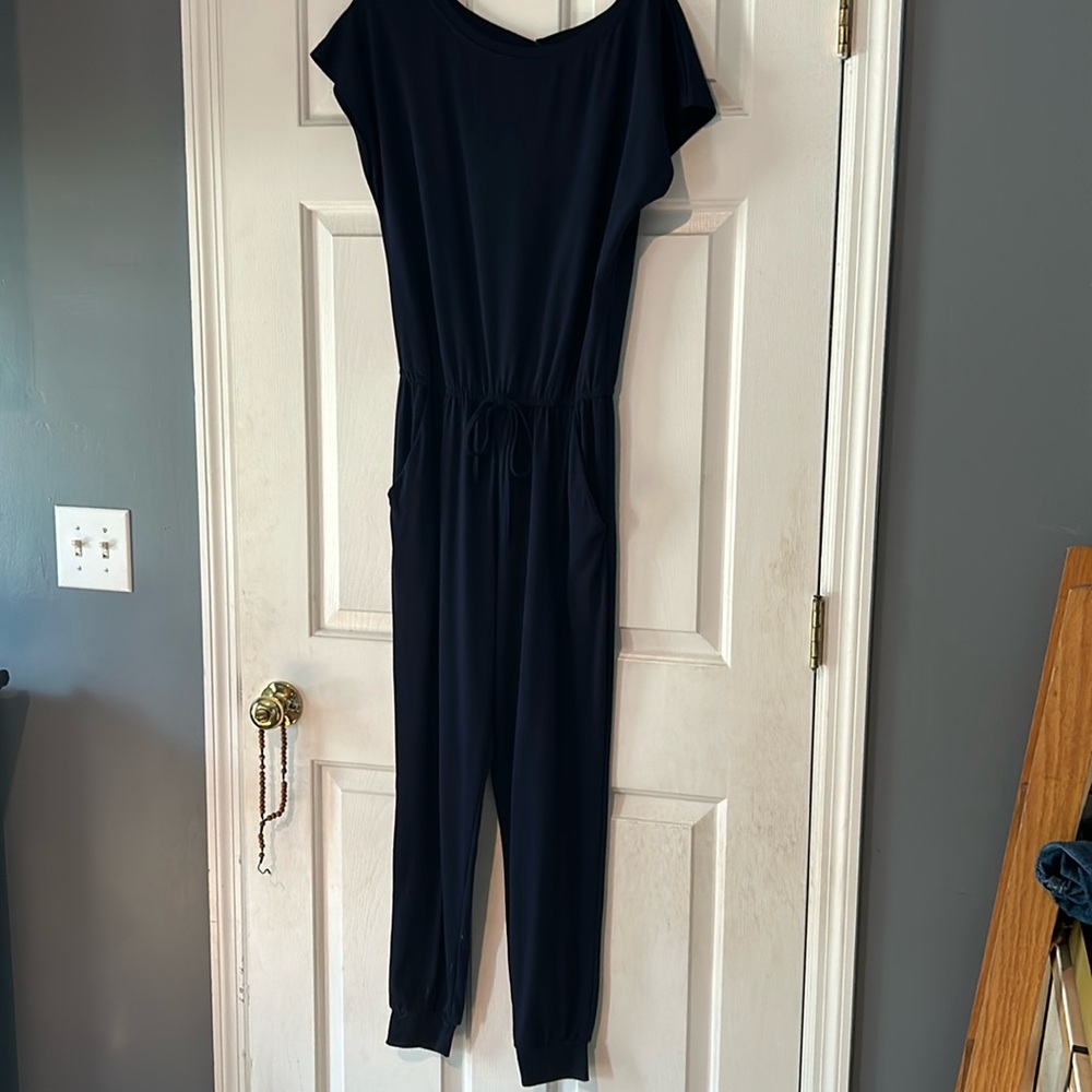 Navy jumpsuit with elastic waist and tie